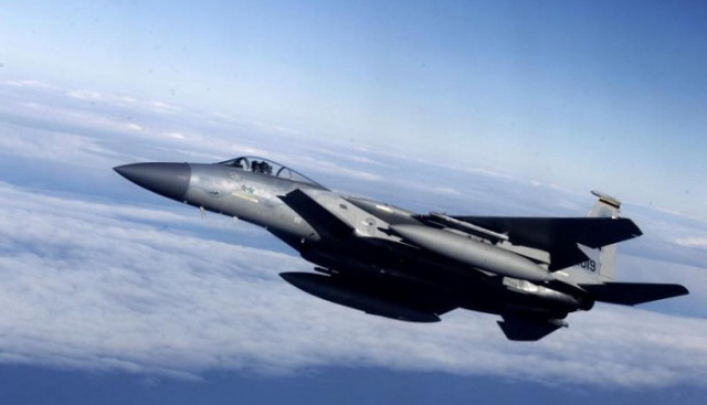 a us air force f 15 fighter is seen as it escorts a lithuania s air force c 27j plane during a joint nato military exercise in siauliai april 1 2014 photo reuters a us air force f 15 fighter is seen as it escorts a lithuania s air force c 27j plane during a joint nato military exercise in siauliai april 1 2014 photo reuters