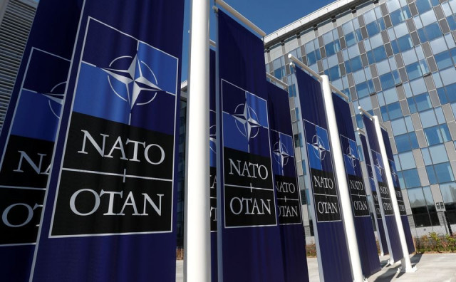 banners displaying the nato logo are placed at the entrance of new nato headquarters during the move to the new building in brussels belgium april 19 2018 photo reuters banners displaying the nato logo are placed at the entrance of new nato headquarters during the move to the new building in brussels belgium april 19 2018 photo reuters