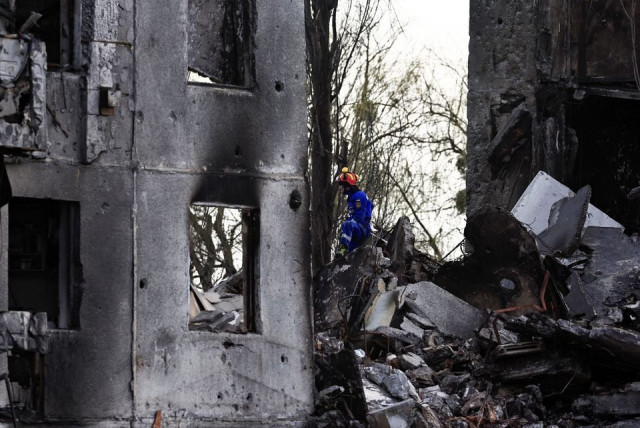 a rescuer sits in a rubble of a building that was destroyed by russian shelling amid russia s invasion of ukraine in borodyanka kyiv region ukraine april 7 2022 photo reuters a rescuer sits in a rubble of a building that was destroyed by russian shelling amid russia s invasion of ukraine in borodyanka kyiv region ukraine april 7 2022 photo reuters