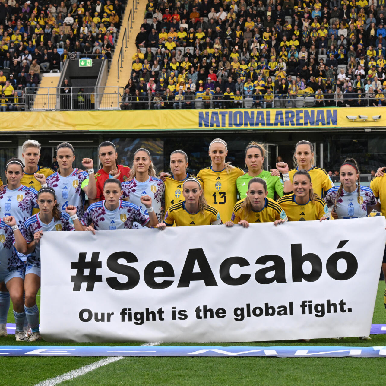 leading the cause the 22 players held up the banner bearing the spanish phrase se acabo adding that the struggle of the players against chauvinism was the global fight photo afp