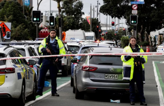 armed police stand guard outside a building construction site following a shooting in the central business district in auckland new zealand july 20 2023 reuters david rowland armed police stand guard outside a building construction site following a shooting in the central business district in auckland new zealand july 20 2023 reuters david rowland