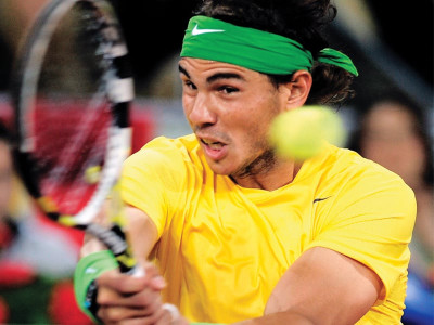 nadal fights back to beat federer