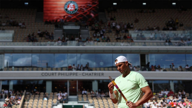 one last time spain s rafael nadal reacts as he takes part in a practice session during the french open tennis tournament on court philippe chatrier at the roland garros complex in paris photo afp