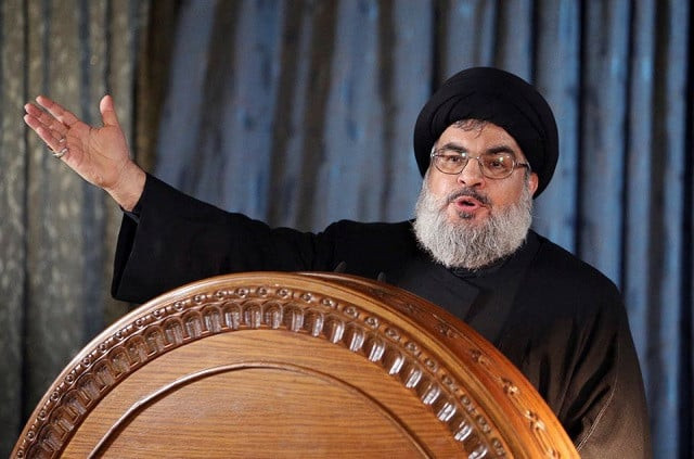 lebanon s hezbollah leader sayyed hassan nasrallah gestures as he addresses his supporters in a rare public appearance during a religious ceremony on the eve of ashura in beirut s southern suburbs november 13 2013 photo reuters lebanon s hezbollah leader sayyed hassan nasrallah gestures as he addresses his supporters in a rare public appearance during a religious ceremony on the eve of ashura in beirut s southern suburbs november 13 2013 photo reuters