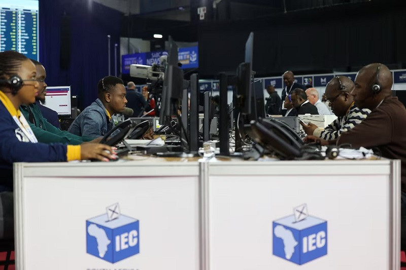 Election staff members work at the National Results Operation Centre of the Electoral Commission of South Africa (IEC), which serves as an operational hub where results of the national election are displayed, in Midrand, South Africa, May 30, 2024. PHOTO: REUTERS