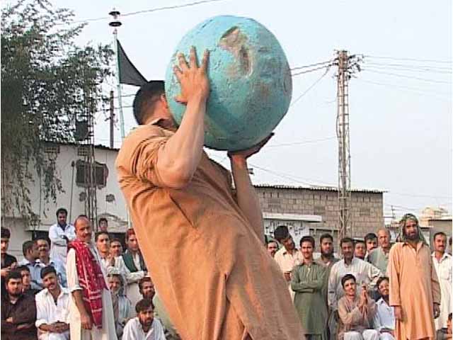 hazara traditions big men prove brawn and bravery with balls of stone