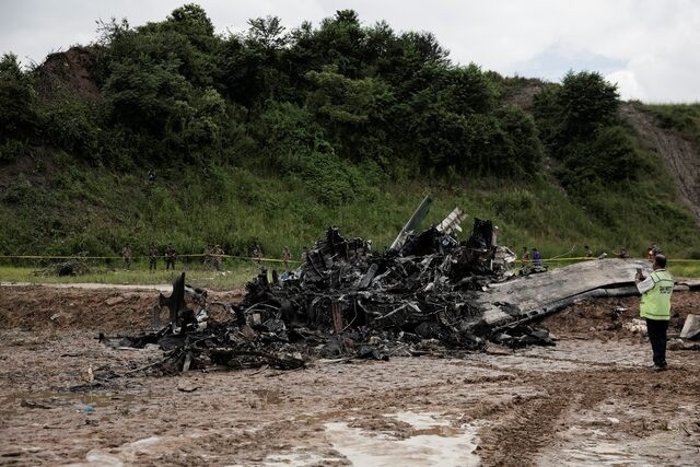 the accident site of a saurya airlines plane that caught fire after skidding off the runway while taking off is cordoned at tribhuvan international airport in kathmandu nepal july 24 2024 photo reuters the accident site of a saurya airlines plane that caught fire after skidding off the runway while taking off is cordoned at tribhuvan international airport in kathmandu nepal july 24 2024 photo reuters