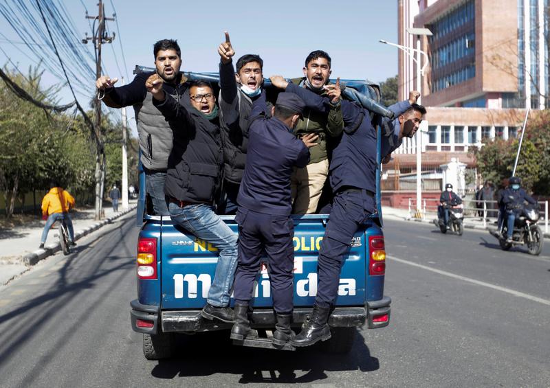 protesters get detained in front of the supreme court as they take part in a protest after the parliament was dissolved and general elections were announced to be held in april and may more than a year ahead of schedule in kathmandu nepal december 25 2020 photo reuters