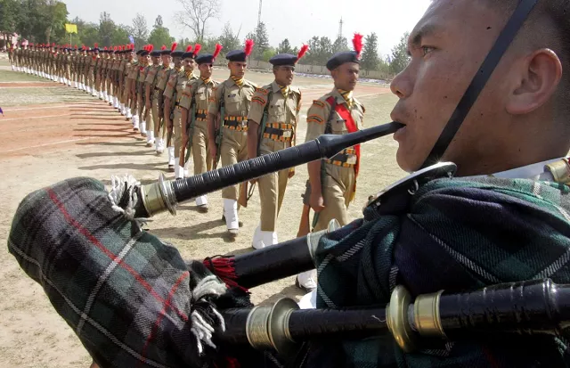 a band member from the gurkha regiment of indian army plays a musical instrument during the passing out parade ceremony of indo tibetan border police in the northern indian city of chandigarh april 25 2008 photo reuters a band member from the gurkha regiment of indian army plays a musical instrument during the passing out parade ceremony of indo tibetan border police in the northern indian city of chandigarh april 25 2008 photo reuters