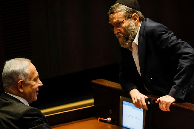 moshe gafni head of united torah judaism party chats with israeli designate prime minister benjamin netanyahu during a session at the plenum at the knesset israel s parliament in jerusalem december 28 2022 photo reuters