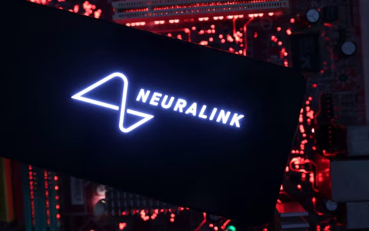 a smartphone with a neuralink logo displayed is placed on a computer motherboard in this illustration taken on may 15 2024 photo reuters