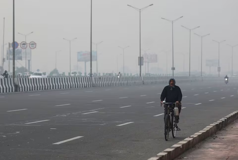 a man rides a cycle amidst the morning smog in new delhi india november 7 2023 photo reuters