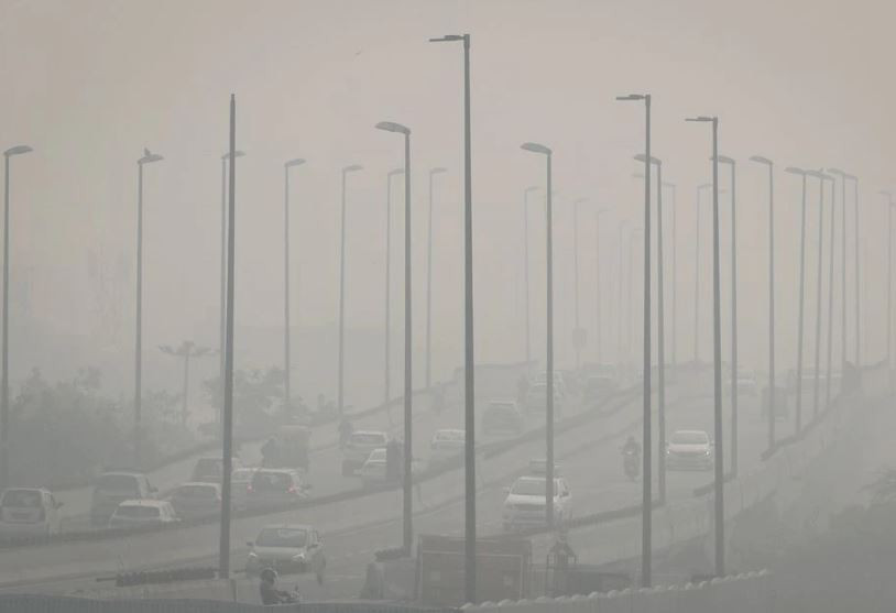 traffic moves on a flyover on a smoggy morning in new delhi india november 4 2021 photo reuters