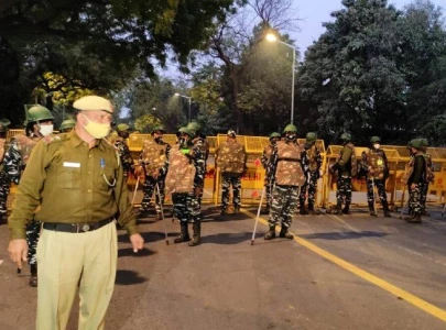 india police block roads into delhi to stop farmers disrupting budget day