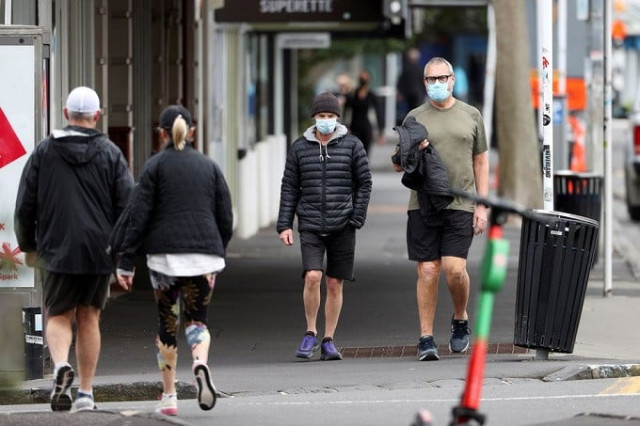 people wear masks as they exercise during a lockdown to curb the spread of a coronavirus disease covid 19 outbreak in auckland new zealand august 26 2021 reuters fiona goodall people wear masks as they exercise during a lockdown to curb the spread of a coronavirus disease covid 19 outbreak in auckland new zealand august 26 2021 reuters fiona goodall