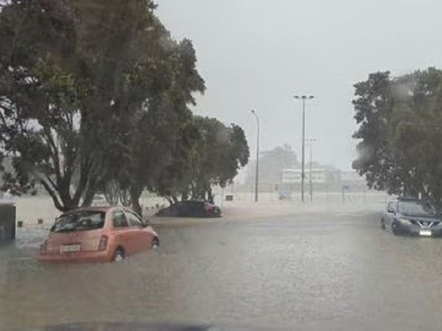 cars are seen in a flooded street during heavy rainfall in auckland new zealand january 27 2023 in this screen grab obtained from a social media video photo reuters file