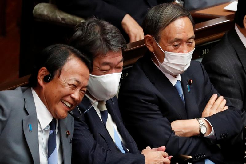 japan s finance minister and deputy prime minister taro aso foreign minister toshimitsu motegi and chief cabinet secretary yoshihide suga attend a parliamentary session at the lower house of the parliament in tokyo japan september 16 2020 photo reuters