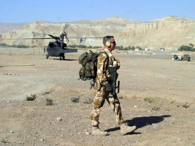 a soldier form new zealand patrols an airstrip in the central province of bamiyan afghanistan photo reuters file a soldier form new zealand patrols an airstrip in the central province of bamiyan afghanistan photo reuters file