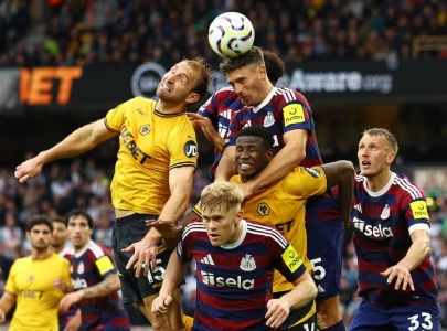 newcastle triumph over wolves with late goals to secure top three spot