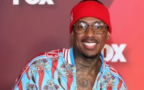 nick cannon discusses busy thanksgiving plans with 11 kids and charity work at l a mission