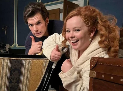 nicola coughlan shares bts of bridgerton set with gift from co star luke newton