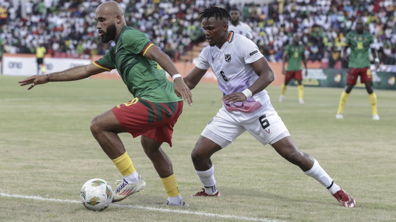 cameroon forward bryan mbeumo l shields the ball from namibia defender ngero katua during a 2025 africa cup of nations qualifier in garoua photo afp