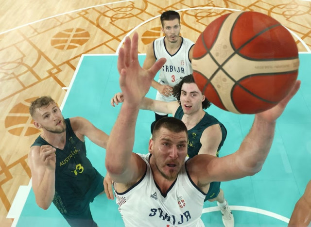nikola jokic of serbia in action against jock landale of australia and josh giddey of australia as filip petrusev of serbia watches photo reuters nikola jokic of serbia in action against jock landale of australia and josh giddey of australia as filip petrusev of serbia watches photo reuters