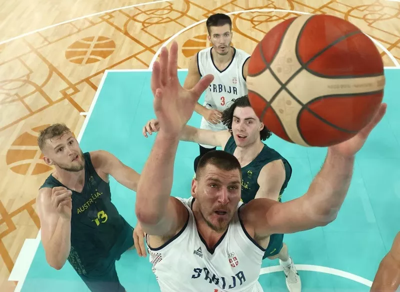 nikola jokic of serbia in action against jock landale of australia and josh giddey of australia as filip petrusev of serbia watches photo reuters nikola jokic of serbia in action against jock landale of australia and josh giddey of australia as filip petrusev of serbia watches photo reuters