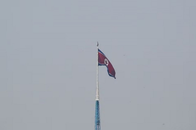 a north korean flag flutters on top of the 160 metre tall tower at north korea s propaganda village of gijungdong september 30 2019 photo reuters a north korean flag flutters on top of the 160 metre tall tower at north korea s propaganda village of gijungdong september 30 2019 photo reuters