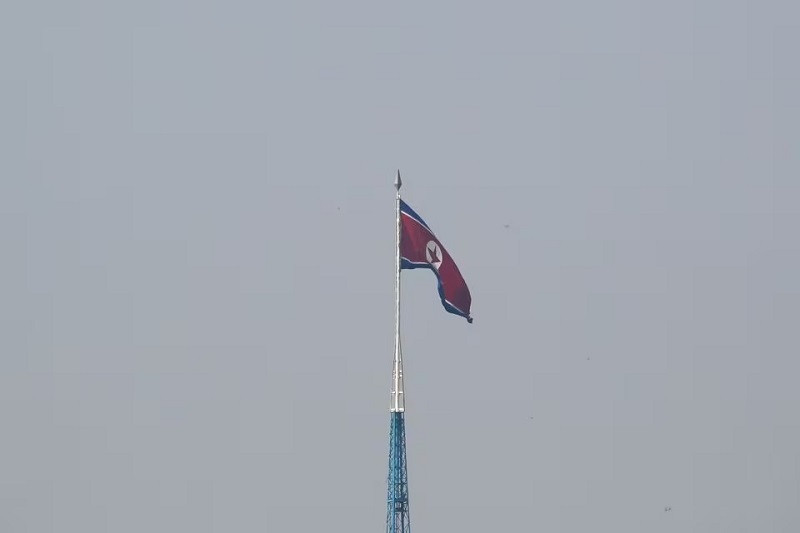 a north korean flag flutters on top of the 160 metre tall tower at north korea s propaganda village of gijungdong september 30 2019 photo reuters