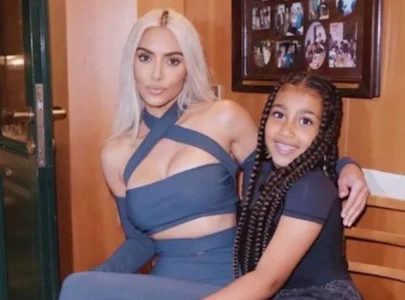 north west surprises kim kardashian with a diamond necklace engraved with this gen alpha slang