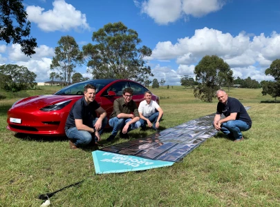 australian scientists to power tesla on 15 000 km trip with printed solar panels
