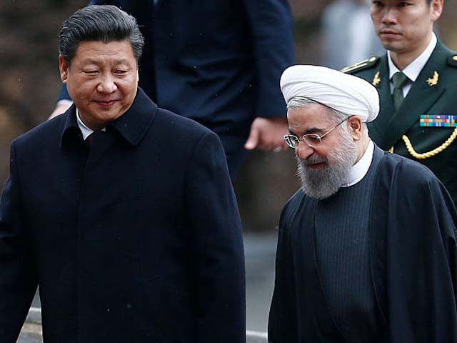 hassan rouhani and xi jinping during a welcoming ceremony photo afp