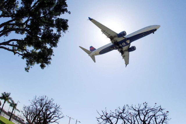 a delta airlines passenger jet approaches to land at lax in los angeles california u s april 7 2021 photo reuters a delta airlines passenger jet approaches to land at lax in los angeles california u s april 7 2021 photo reuters