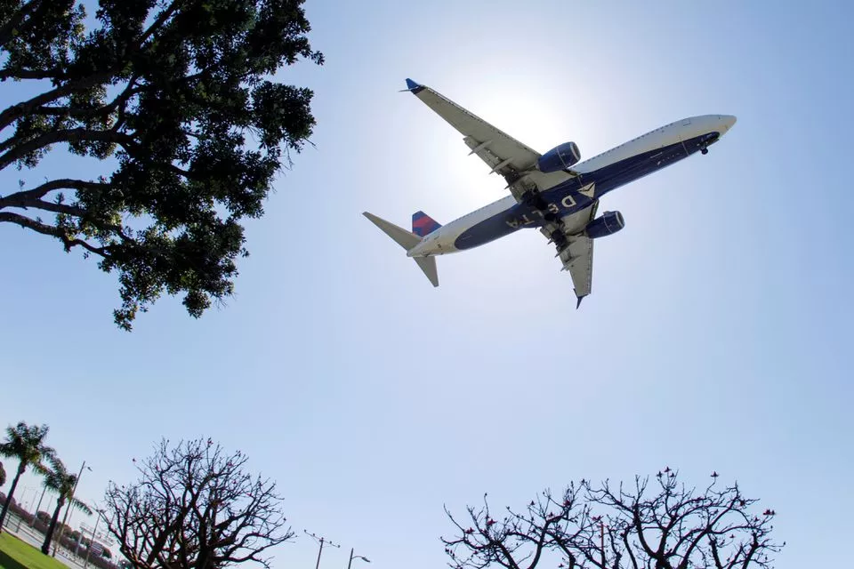 a delta airlines passenger jet approaches to land at lax in los angeles california u s april 7 2021 photo reuters a delta airlines passenger jet approaches to land at lax in los angeles california u s april 7 2021 photo reuters
