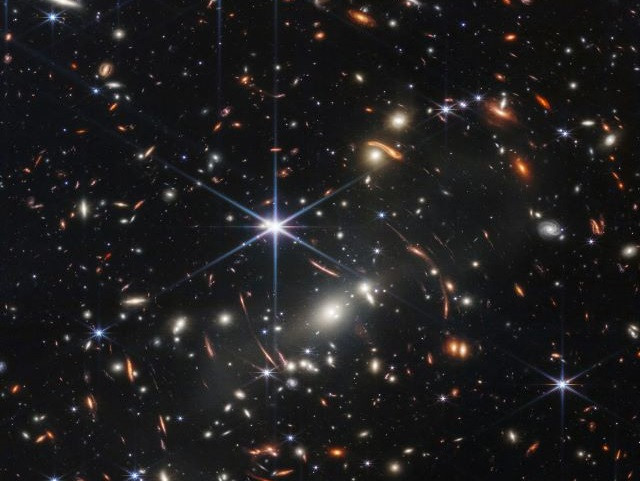 the first full color image from nasa s james webb space telescope shows the galaxy cluster smacs 0723 known as webb s first deep field in a composite made from images at different wavelengths taken with a near infrared camera and released july 11 2022 nasa esa csa stsci webb ero production team handout via reuters