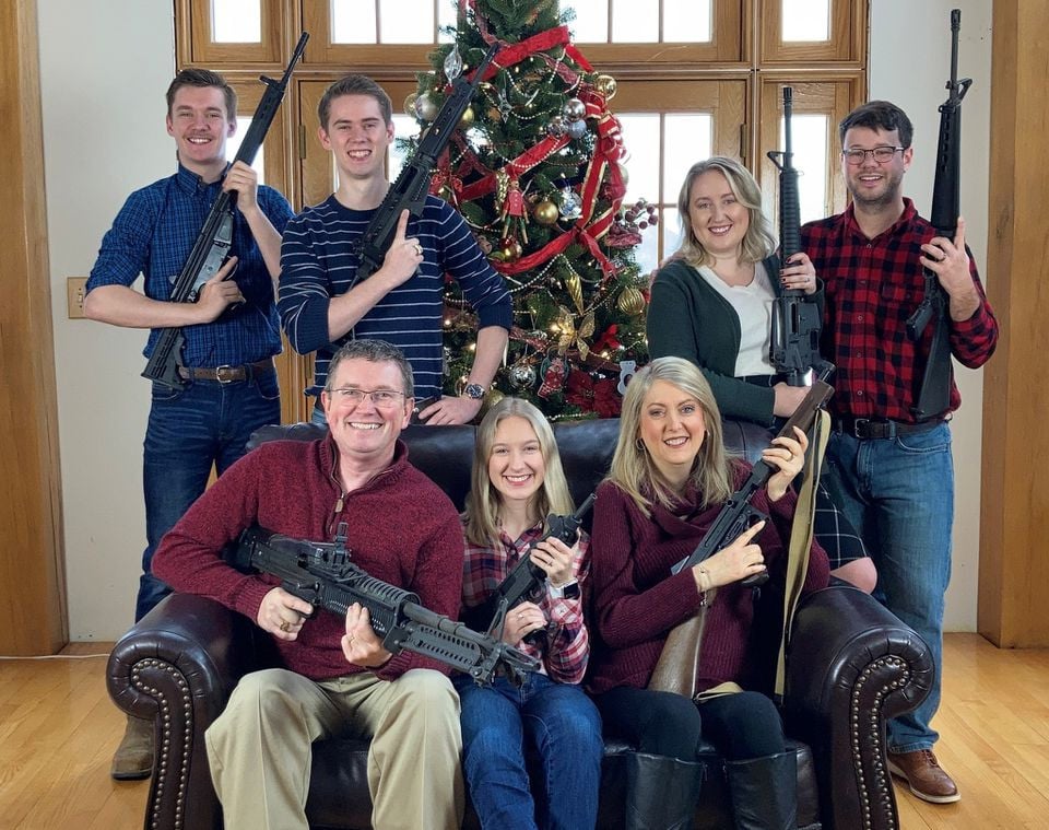 u s rep thomas massie r ky in a christmas photo of his family holding guns in this image obtained from twitter posted on december 4 2021 courtesy of twitter repthomasmassie social media via reuters