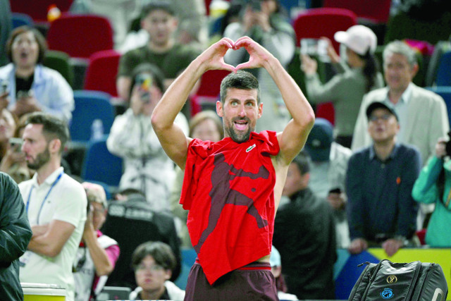 novak djokovic celebrates after his victory against taylor fritz in their semi final match during the shanghai masters tennis tournament photo afp novak djokovic celebrates after his victory against taylor fritz in their semi final match during the shanghai masters tennis tournament photo afp