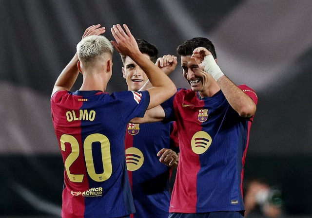 barcelona s dani olmo pau victor and robert lewandowski celebrate after winning laliga match against rayo vallecano v fc barcelona at campo de futbol de vallecas madrid spain on august 27 2024 photo reuters barcelona s dani olmo pau victor and robert lewandowski celebrate after winning laliga match against rayo vallecano v fc barcelona at campo de futbol de vallecas madrid spain on august 27 2024 photo reuters