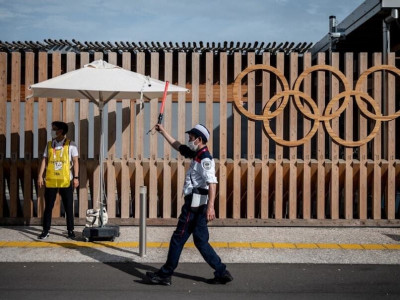 coronavirus hits olympic village for first time