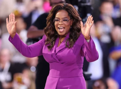 oprah winfrey surprise appearance at dnc takes aim at j d vance s childless cat lady comments
