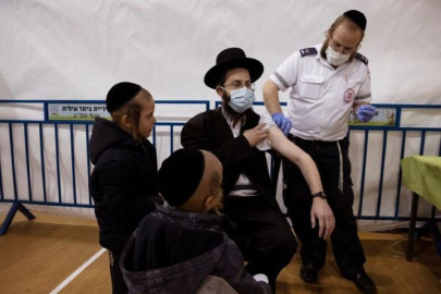 israel s ultra orthodox jews get covid vaccine but still face resentment