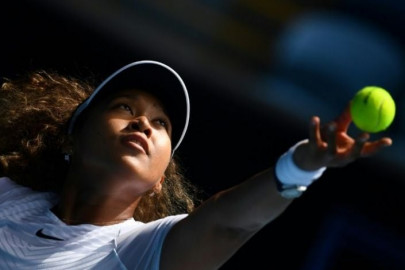 osaka barty struggle but reach melbourne quarters as halep cruises