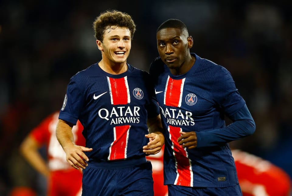 paris st germain s ousmane dembele and joao neves celebrate after fabian ruiz scores their second goal against brest duirng ligue 1 match at ances paris france on september 14 2024 photo reuters