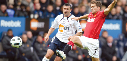 owen rescues united in draw with bolton