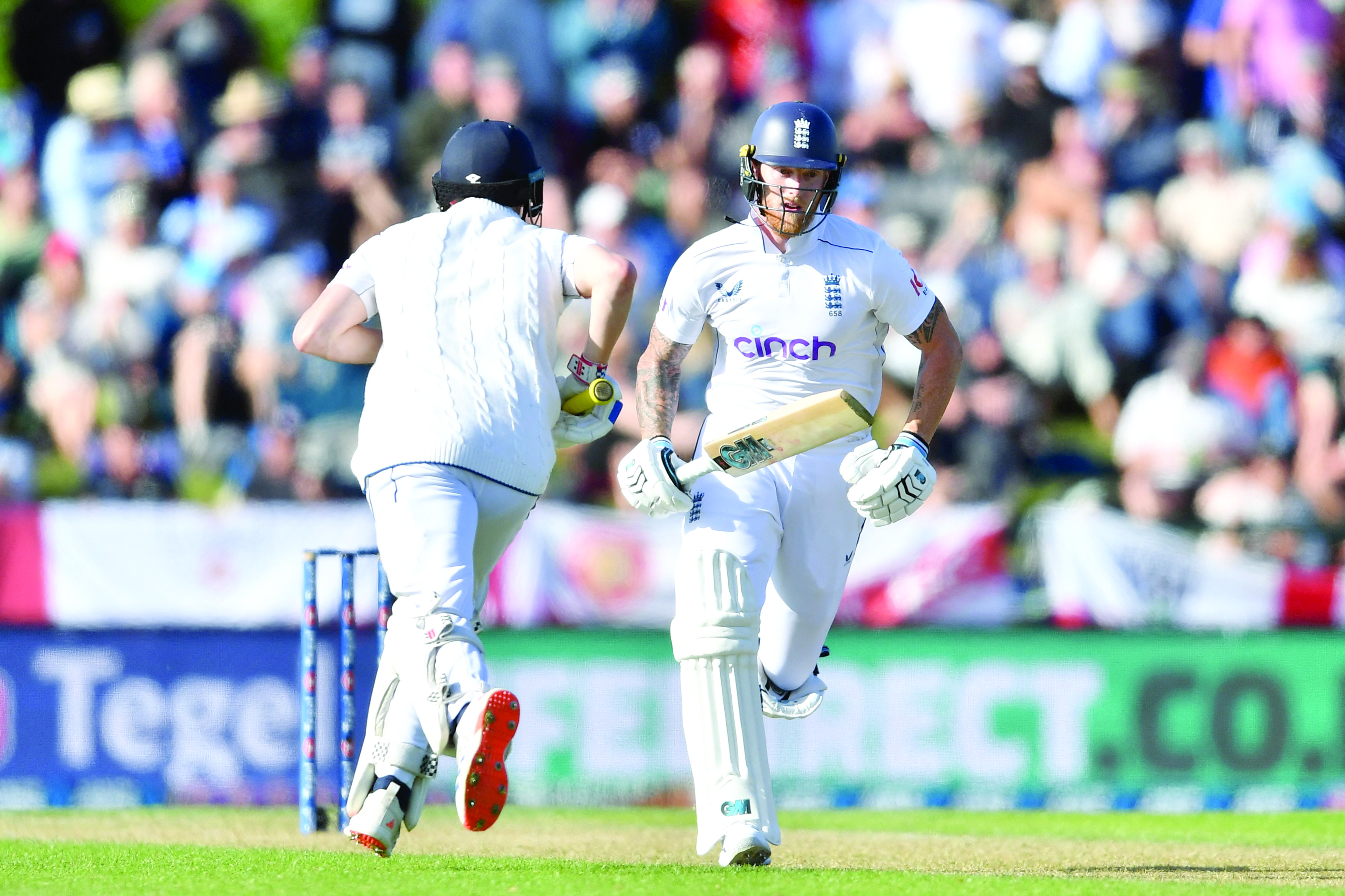 ben stokes and harry brook run between the wickets during first test against new zealand in christchurch on november 29 2024 photo afp