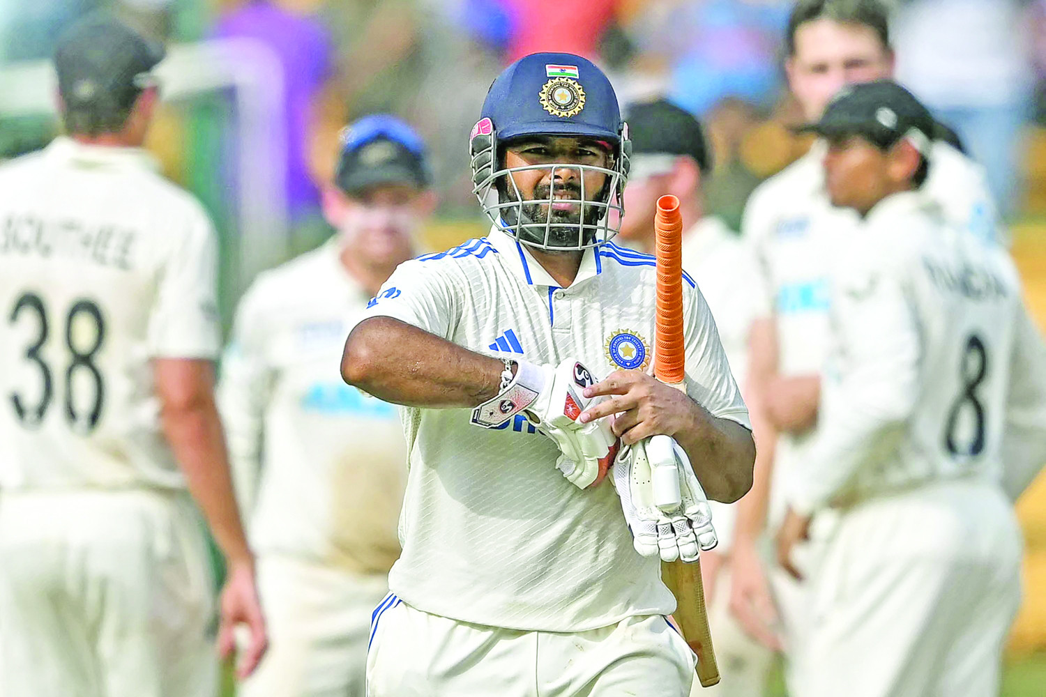 india s rishabh pant walks back to the pavilion after his dismissal on 99 on the fourth day of the first test against new zealand in bengaluru photo afp