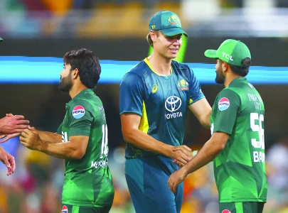 aus beat pak in rain hit t20 clash