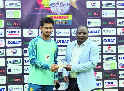 saim hits ton as pak thrash zim