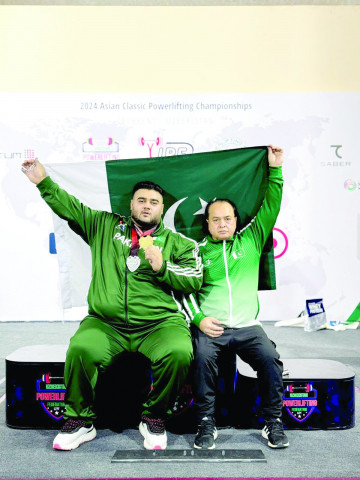 nooh dastgir with his father and coach ghulam dastgir after winning the asian powerlifting championship medal photo courtesy nooh dastgir nooh dastgir with his father and coach ghulam dastgir after winning the asian powerlifting championship medal photo courtesy nooh dastgir